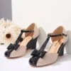 Unique Vintage Cream & Black Bow T-Strap Wedges