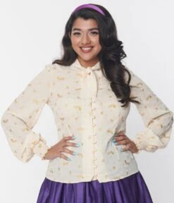 Willy Wonka X Unique Vintage Cream & Gold Neck Tie Blouse Glitter Wonka Print -Pleaser Clothing Store willy wonka x unique vintage cream gold neck tie blouse glitter wonka print 675957